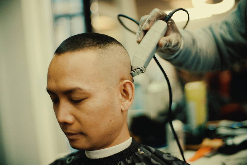 Clipper fade in progress at RDH Barbers, a Black barbershop near Kensington Market Toronto